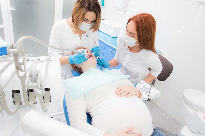 Лечение зубов при беременности